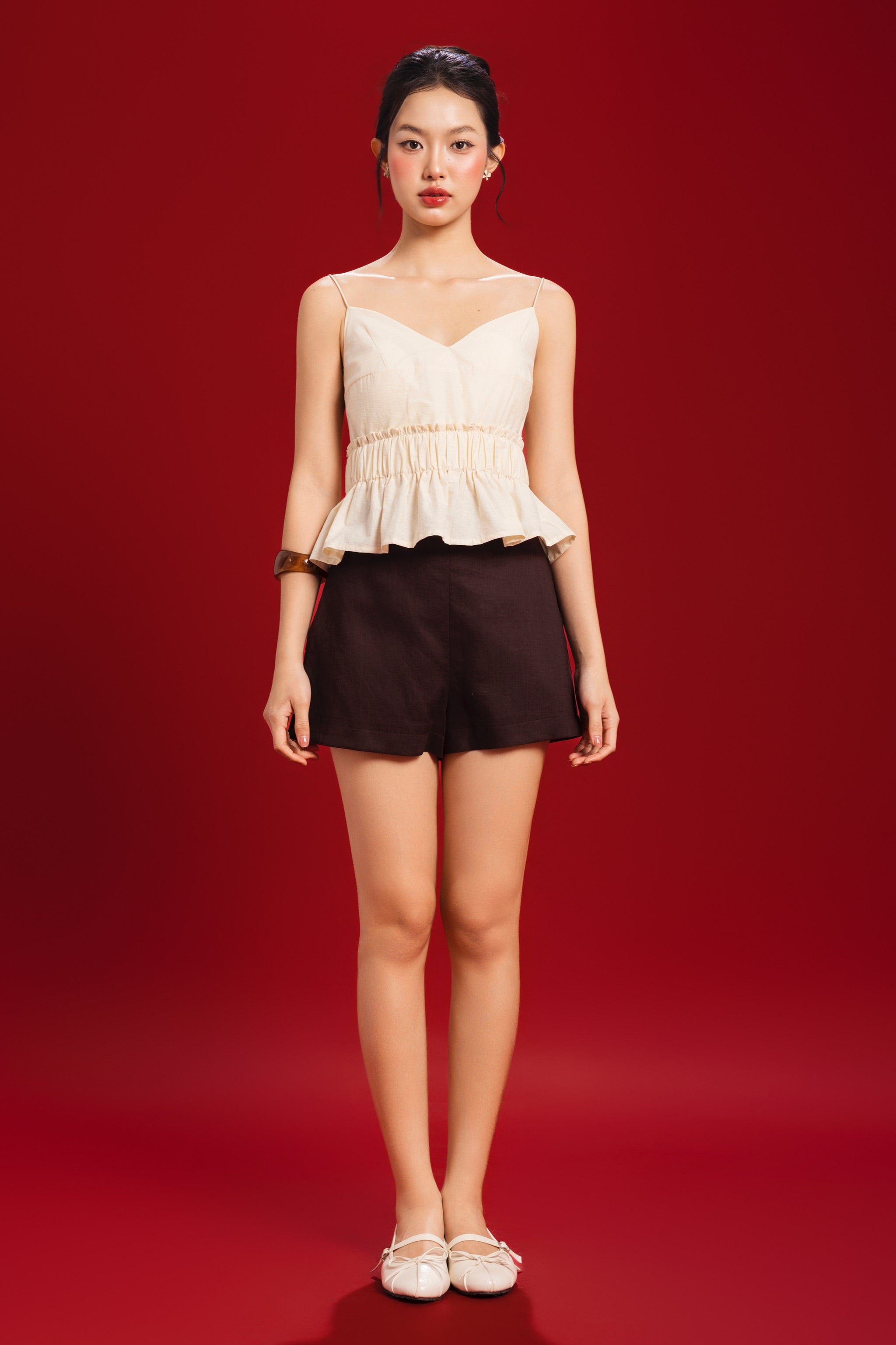 Poppy V-neck Padded Peplum Top in Yellow Creme