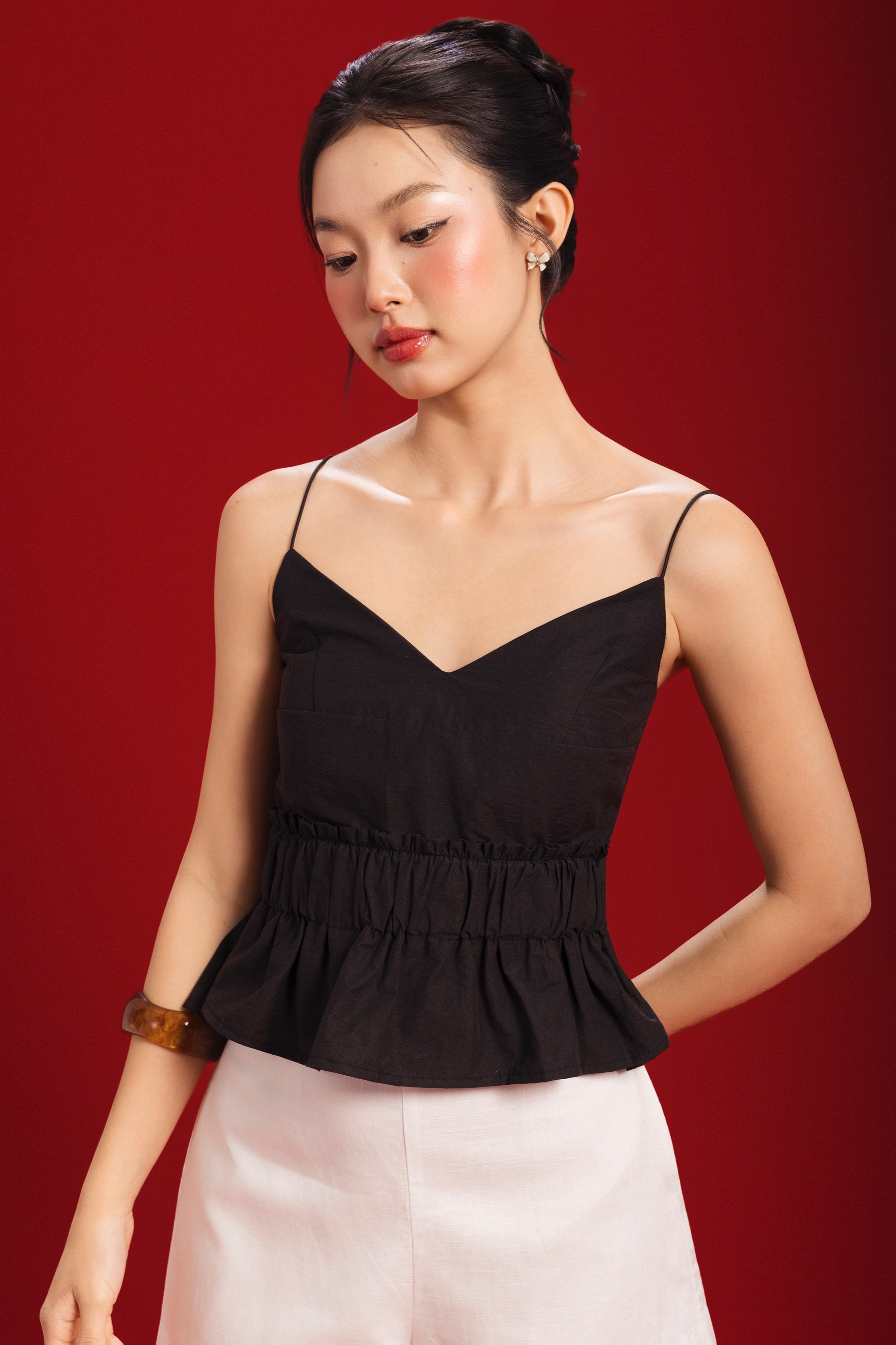Poppy V-neck Padded Peplum Top in Black